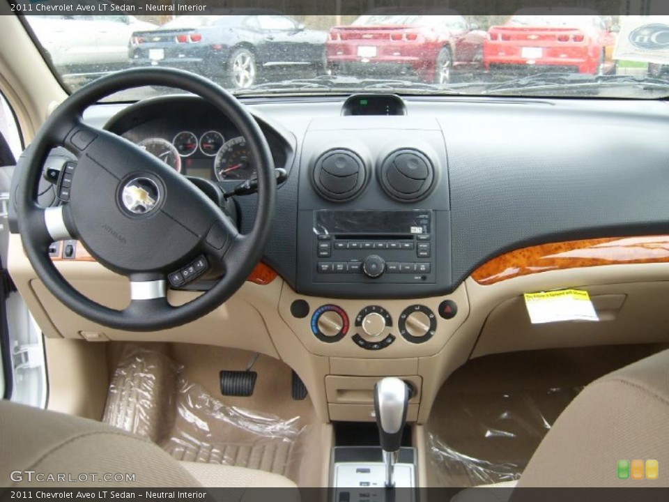 Neutral Interior Dashboard for the 2011 Chevrolet Aveo LT Sedan #48340873