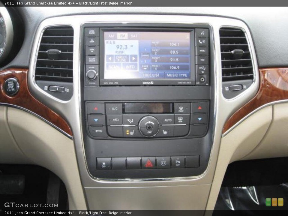 Black/Light Frost Beige Interior Controls for the 2011 Jeep Grand Cherokee Limited 4x4 #48354619