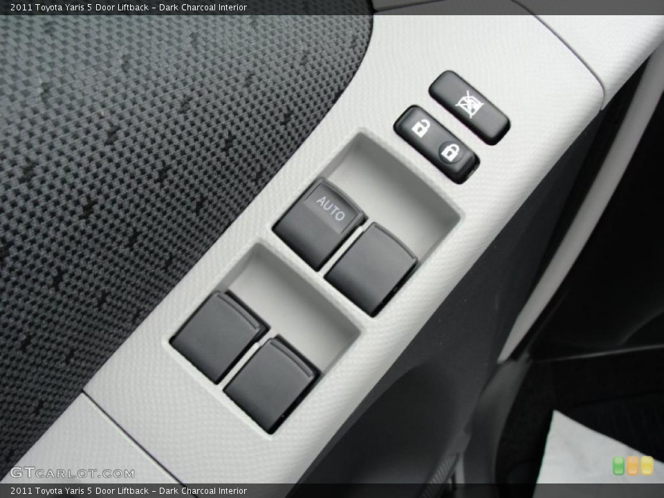 Dark Charcoal Interior Controls for the 2011 Toyota Yaris 5 Door Liftback #48380018