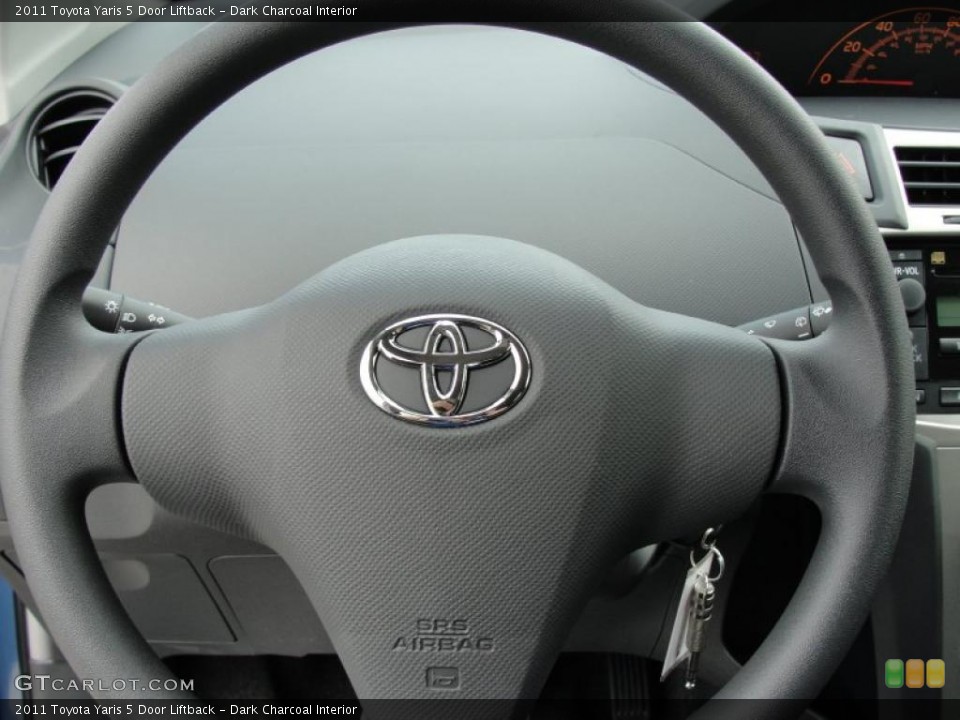 Dark Charcoal Interior Steering Wheel for the 2011 Toyota Yaris 5 Door Liftback #48380105