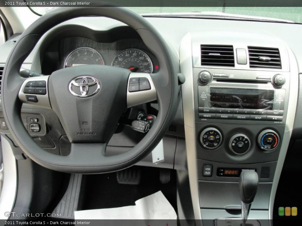 Dark Charcoal Interior Steering Wheel for the 2011 Toyota Corolla S #48380735