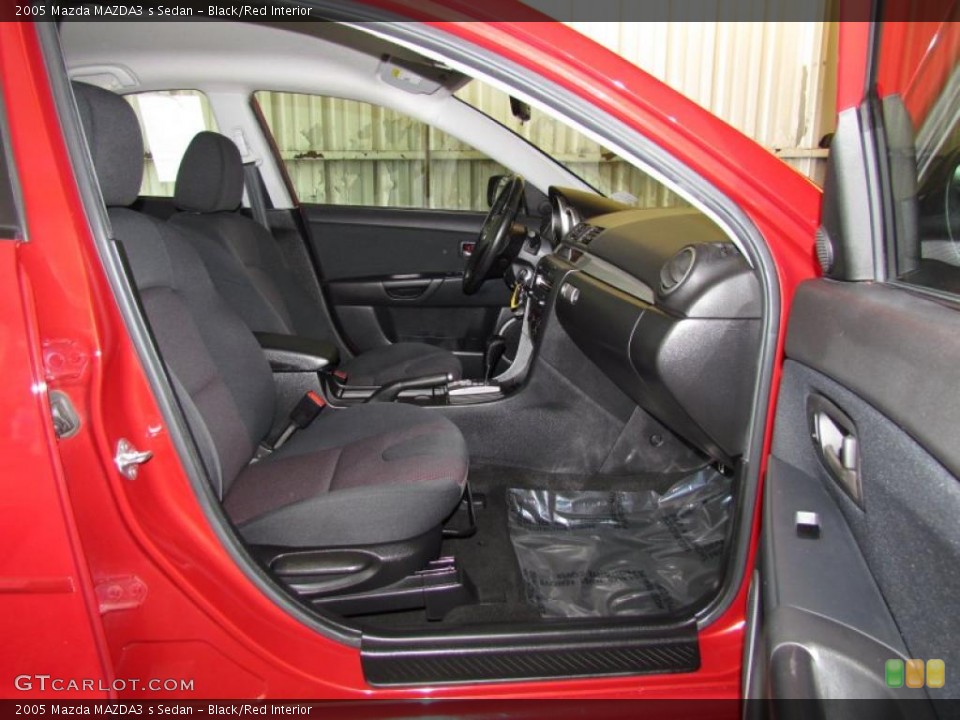 Black/Red Interior Photo for the 2005 Mazda MAZDA3 s Sedan #48433596