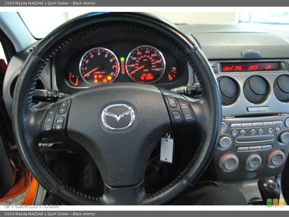 Black Interior Steering Wheel for the 2004 Mazda MAZDA6 s Sport Sedan #48433998