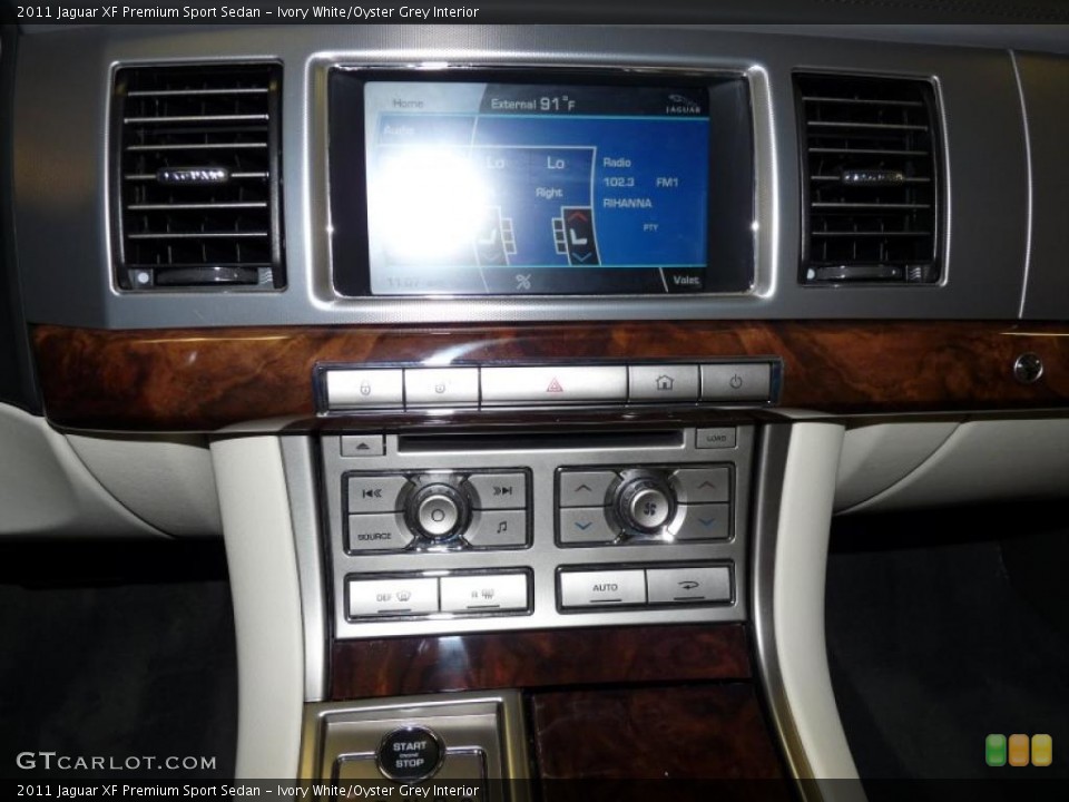 Ivory White/Oyster Grey Interior Controls for the 2011 Jaguar XF Premium Sport Sedan #48434262