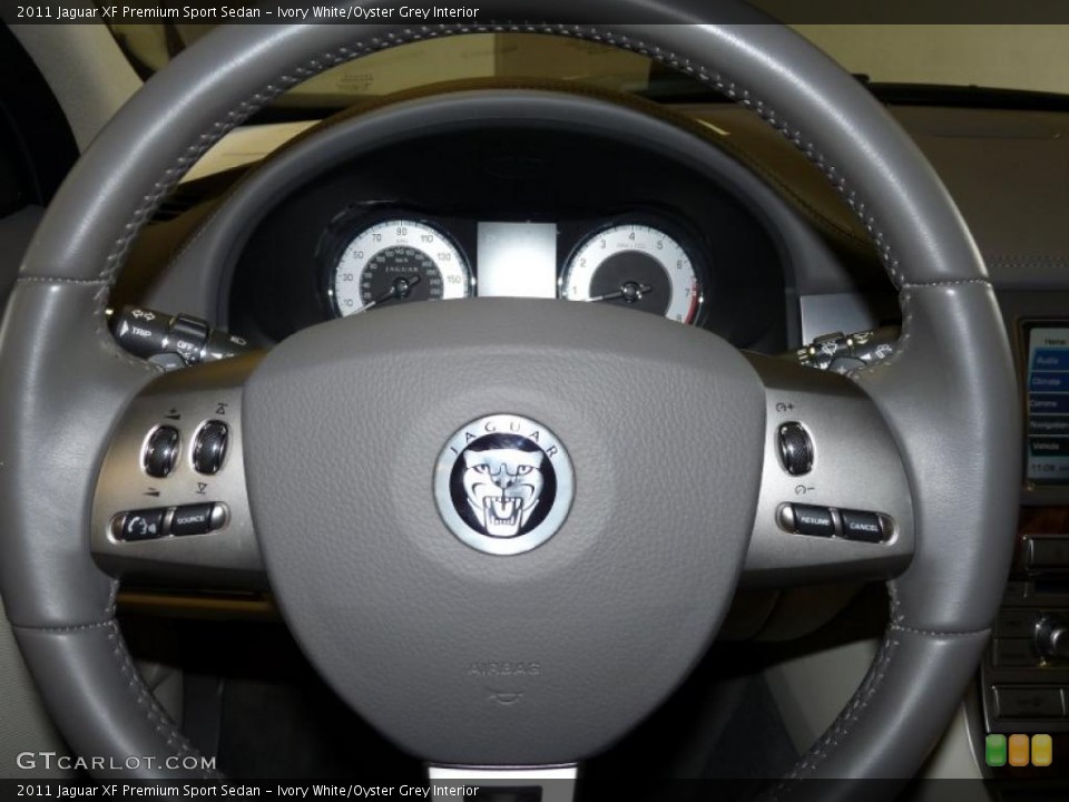 Ivory White/Oyster Grey Interior Steering Wheel for the 2011 Jaguar XF Premium Sport Sedan #48434295