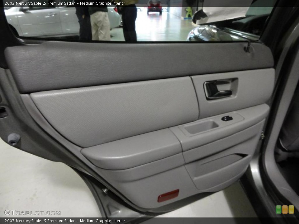 Medium Graphite Interior Door Panel for the 2003 Mercury Sable LS Premium Sedan #48448269