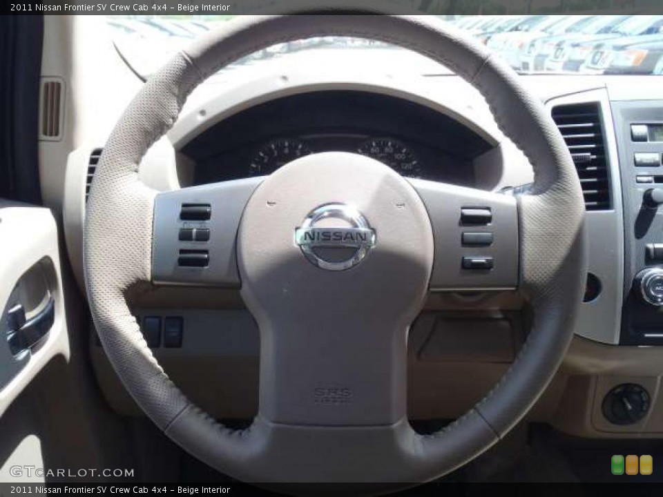 Beige Interior Steering Wheel for the 2011 Nissan Frontier SV Crew Cab 4x4 #48461634