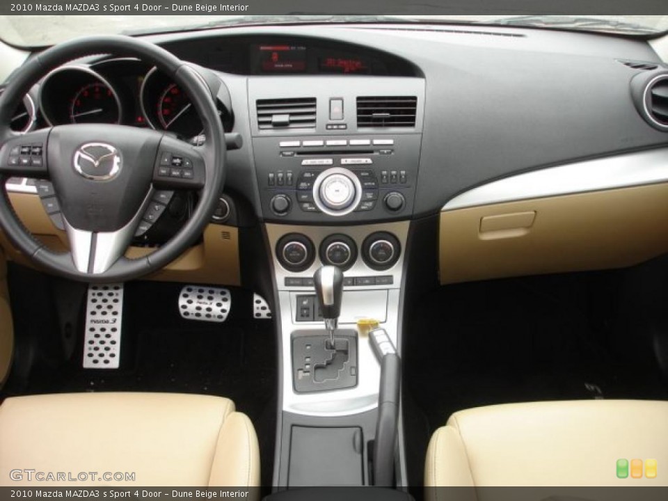 Dune Beige Interior Dashboard for the 2010 Mazda MAZDA3 s Sport 4 Door #48475122