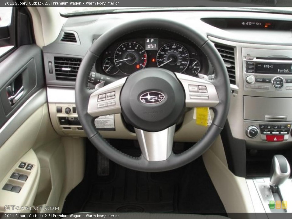 Warm Ivory Interior Steering Wheel for the 2011 Subaru Outback 2.5i Premium Wagon #48476853