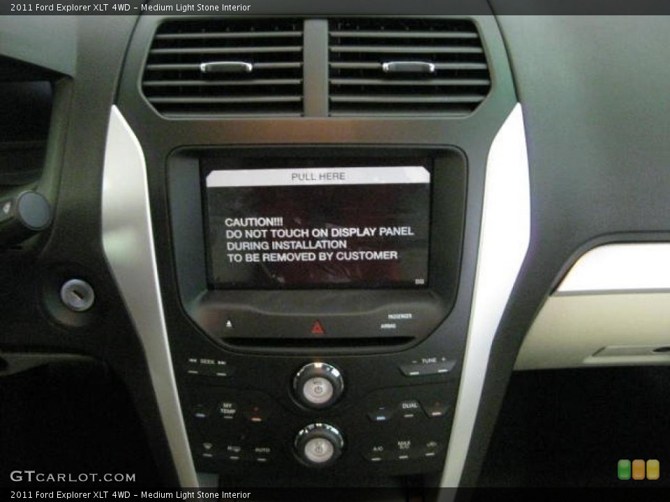 Medium Light Stone Interior Controls for the 2011 Ford Explorer XLT 4WD #48483595