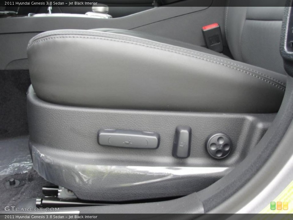 Jet Black Interior Controls for the 2011 Hyundai Genesis 3.8 Sedan #48484338