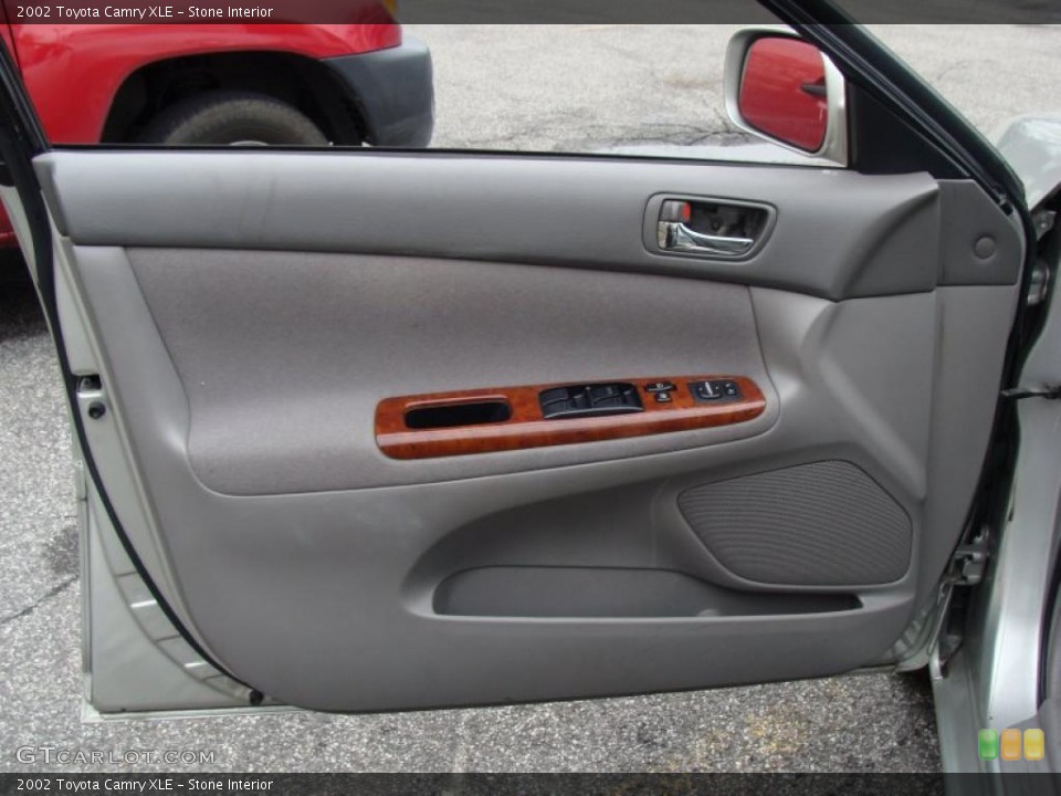 Stone Interior Door Panel for the 2002 Toyota Camry XLE #48493423