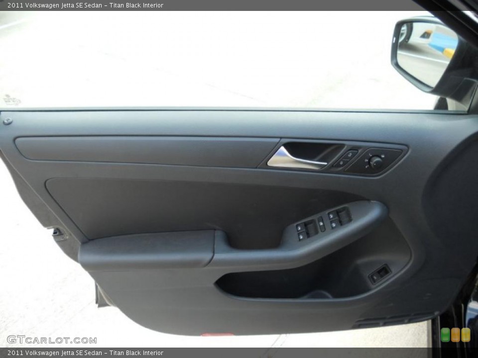 Titan Black Interior Door Panel for the 2011 Volkswagen Jetta SE Sedan #48497944