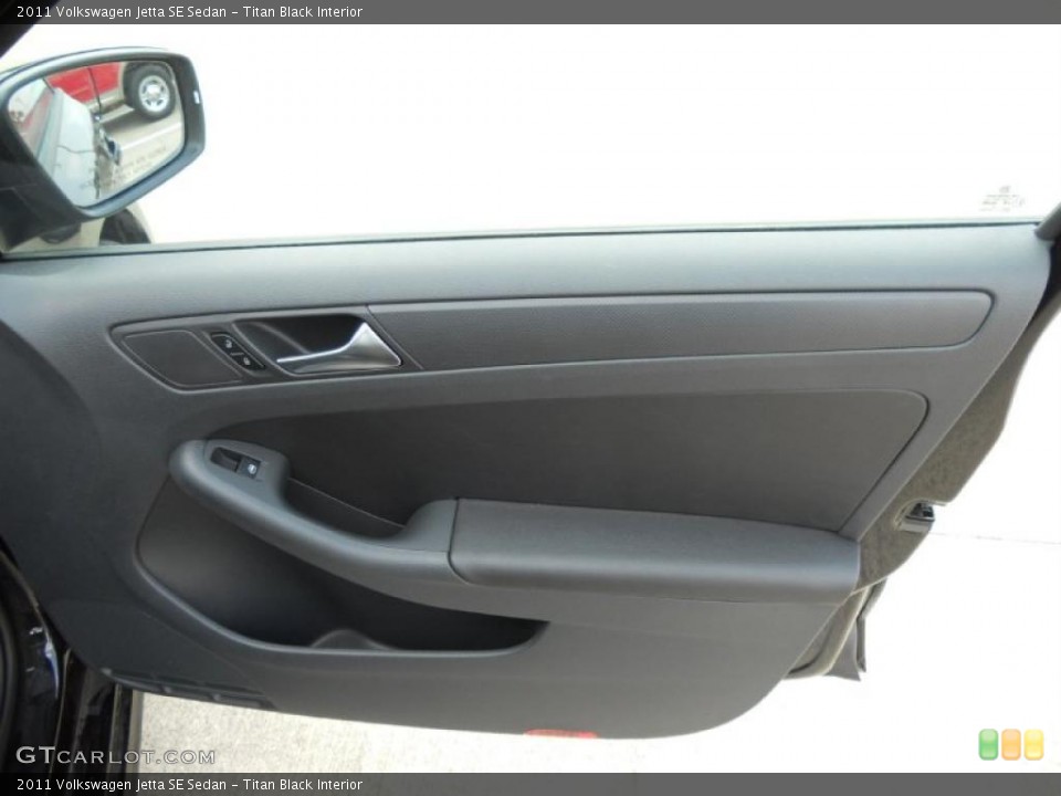 Titan Black Interior Door Panel for the 2011 Volkswagen Jetta SE Sedan #48497962