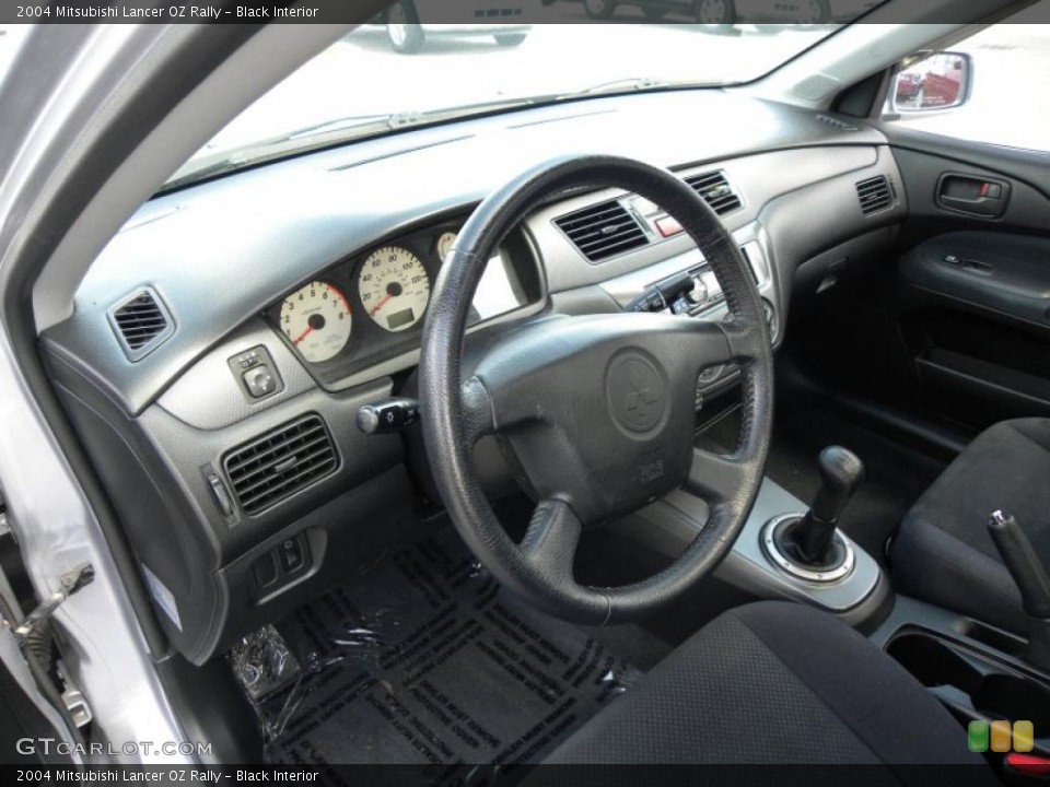 Black Interior Photo for the 2004 Mitsubishi Lancer OZ Rally #48499426