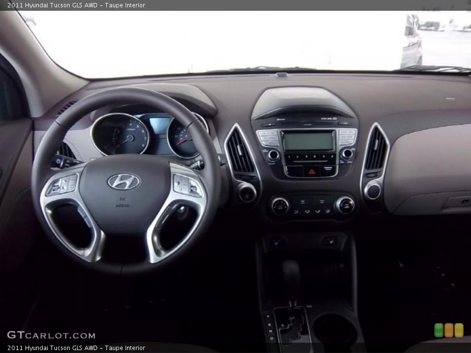Taupe Interior Dashboard for the 2011 Hyundai Tucson GLS AWD #48522529