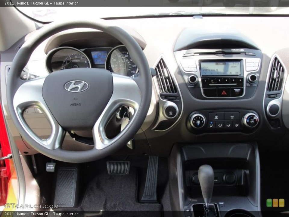 Taupe Interior Dashboard for the 2011 Hyundai Tucson GL #48532843
