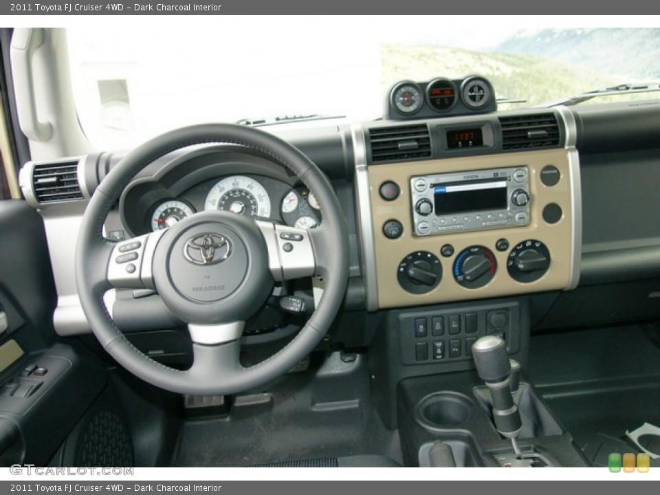 Dark Charcoal Interior Dashboard for the 2011 Toyota FJ Cruiser 4WD #48534689