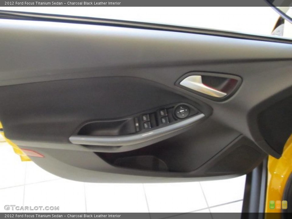 Charcoal Black Leather Interior Door Panel for the 2012 Ford Focus Titanium Sedan #48547220