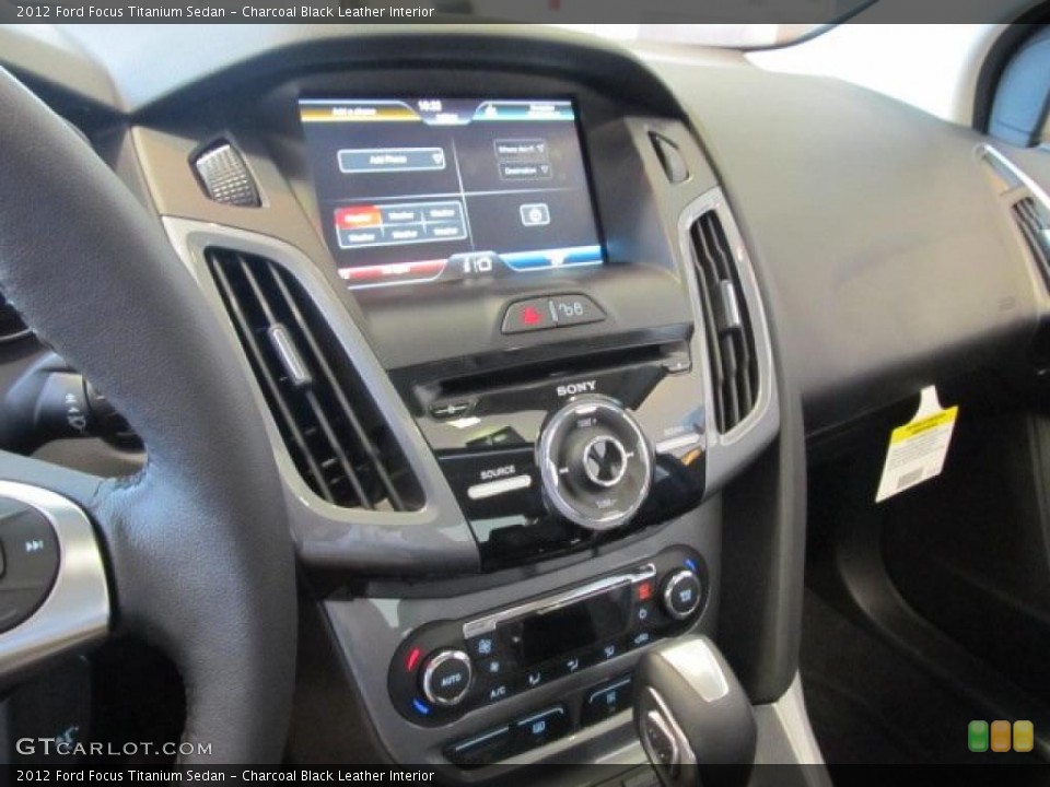 Charcoal Black Leather Interior Controls for the 2012 Ford Focus Titanium Sedan #48547265