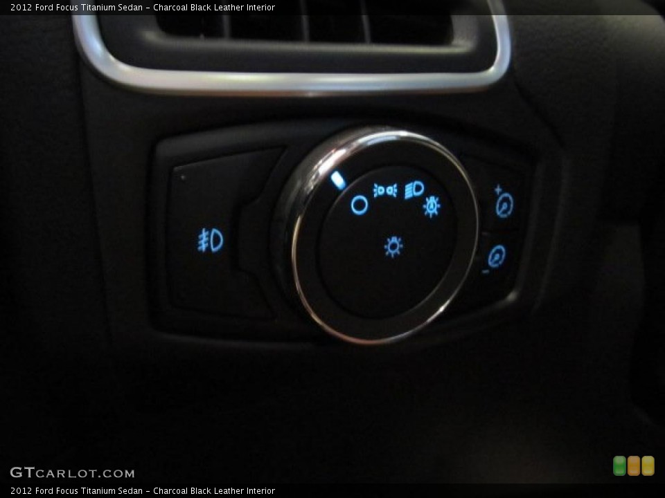 Charcoal Black Leather Interior Controls for the 2012 Ford Focus Titanium Sedan #48547277