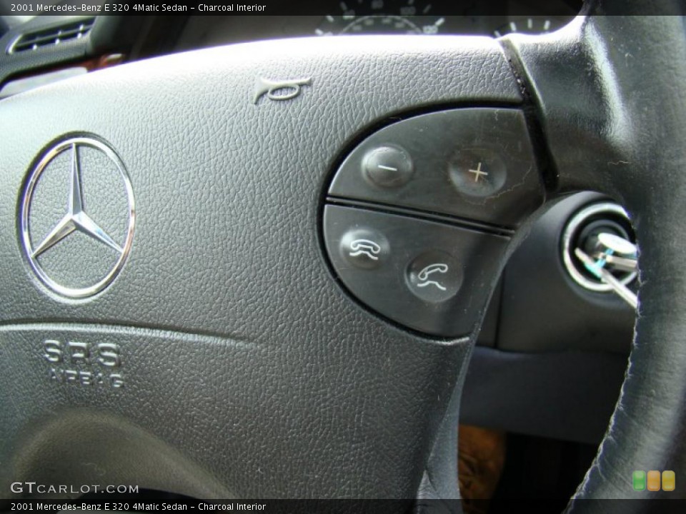 Charcoal Interior Controls for the 2001 Mercedes-Benz E 320 4Matic Sedan #48558113
