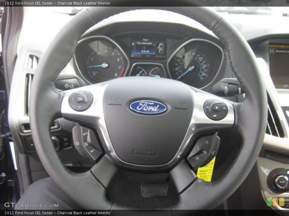 Charcoal Black Leather Interior Steering Wheel for the 2012 Ford Focus SEL Sedan #48566503