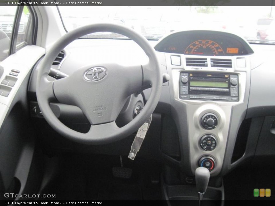 Dark Charcoal Interior Controls for the 2011 Toyota Yaris 5 Door Liftback #48573812