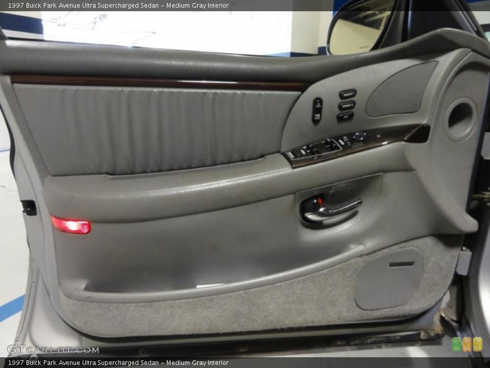 Medium Gray Interior Door Panel for the 1997 Buick Park Avenue Ultra Supercharged Sedan #48576356