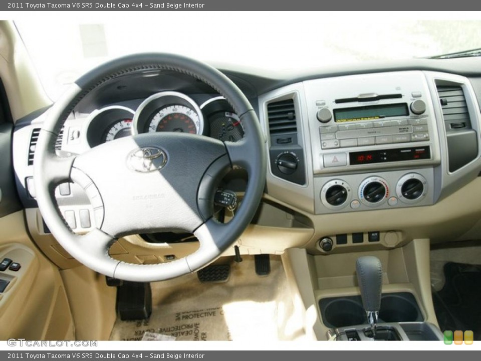 Sand Beige Interior Dashboard for the 2011 Toyota Tacoma V6 SR5 Double Cab 4x4 #48609947