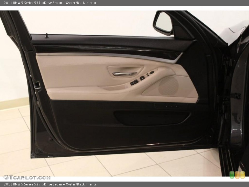 Oyster/Black Interior Door Panel for the 2011 BMW 5 Series 535i xDrive Sedan #48611579