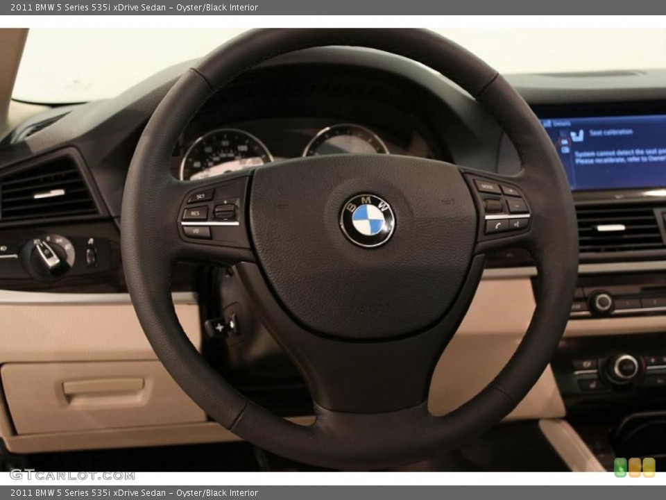 Oyster/Black Interior Steering Wheel for the 2011 BMW 5 Series 535i xDrive Sedan #48611669