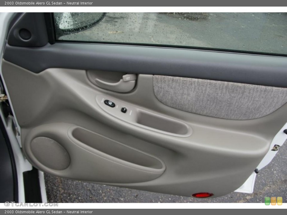 Neutral Interior Door Panel for the 2003 Oldsmobile Alero GL Sedan #48620486