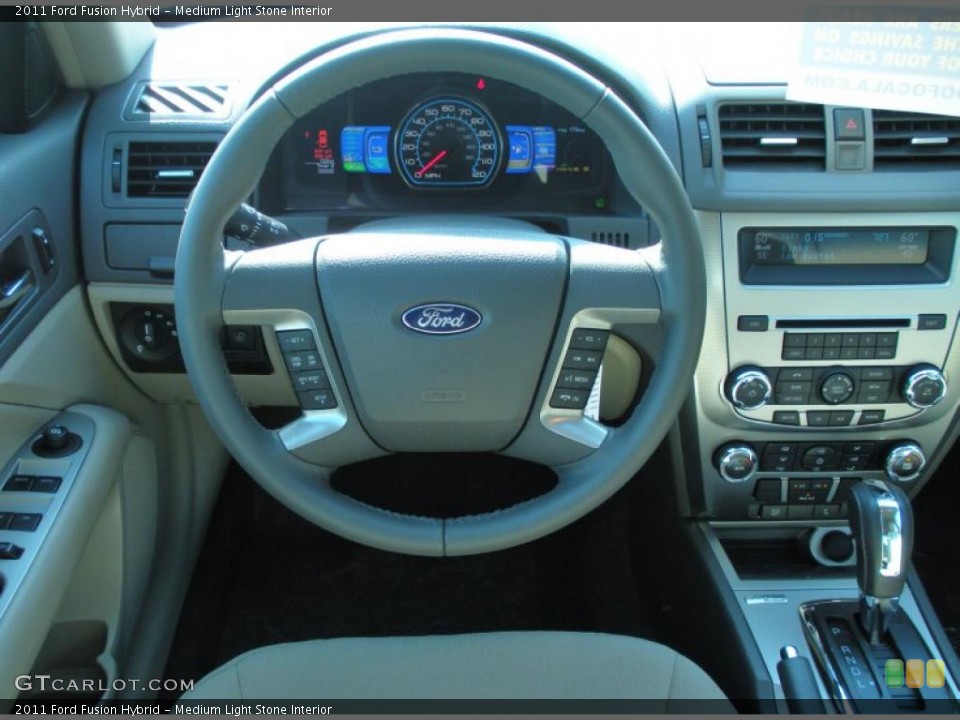 Medium Light Stone Interior Dashboard for the 2011 Ford Fusion Hybrid #48633359