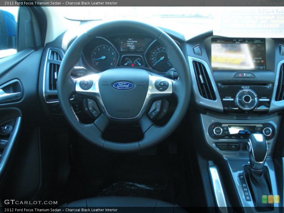Charcoal Black Leather Interior Dashboard for the 2012 Ford Focus Titanium Sedan #48634091