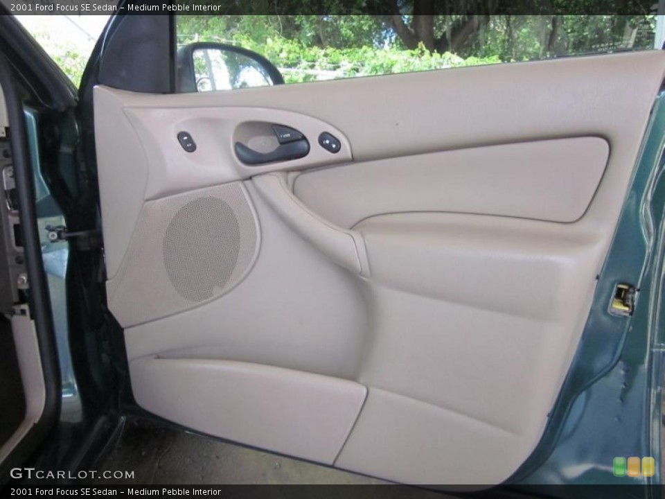 Medium Pebble Interior Door Panel for the 2001 Ford Focus SE Sedan #48635599