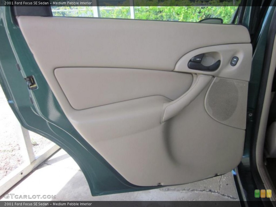 Medium Pebble Interior Door Panel for the 2001 Ford Focus SE Sedan #48635612
