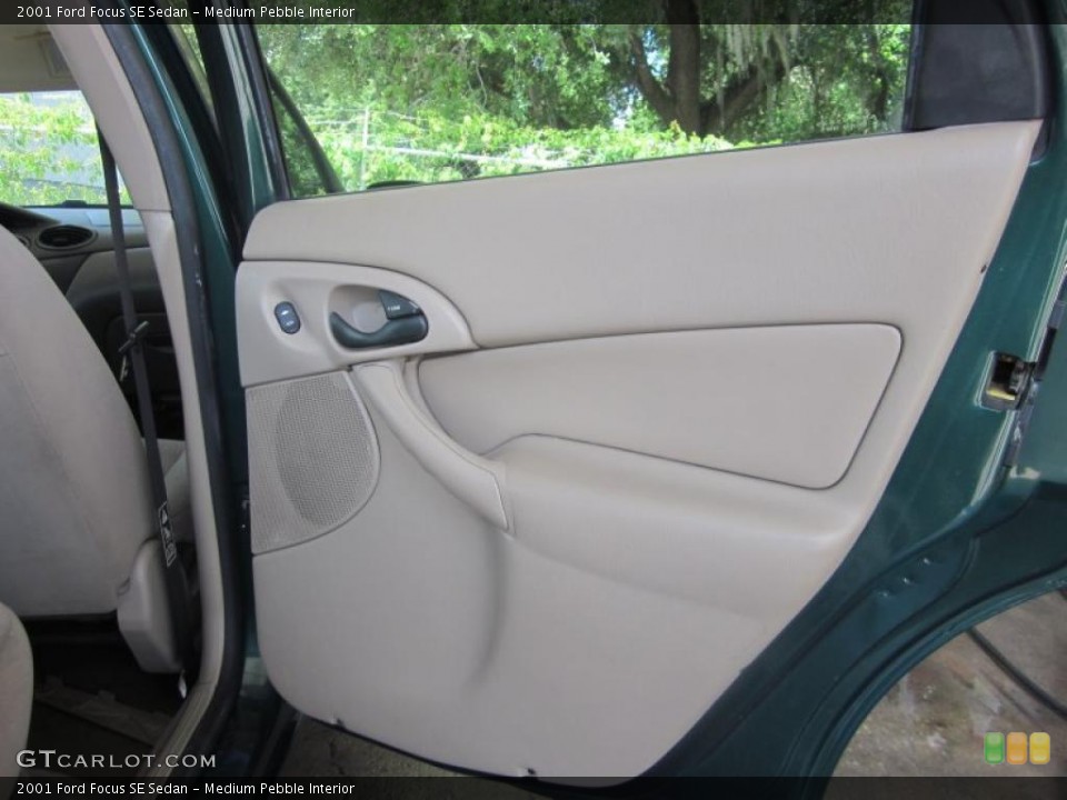 Medium Pebble Interior Door Panel for the 2001 Ford Focus SE Sedan #48635627