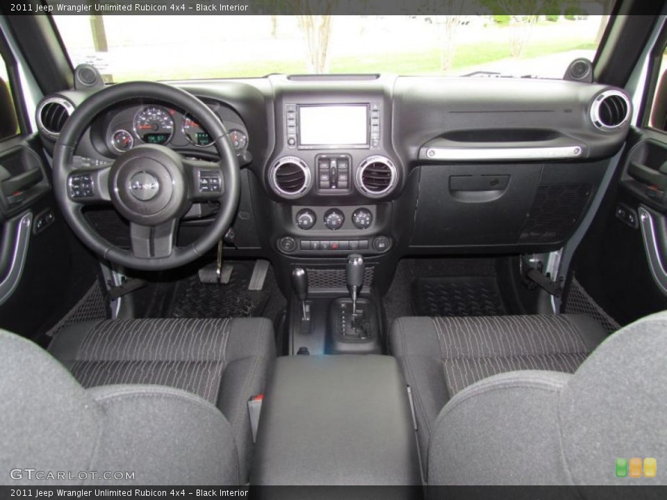 Black Interior Dashboard for the 2011 Jeep Wrangler Unlimited Rubicon 4x4 #48644788
