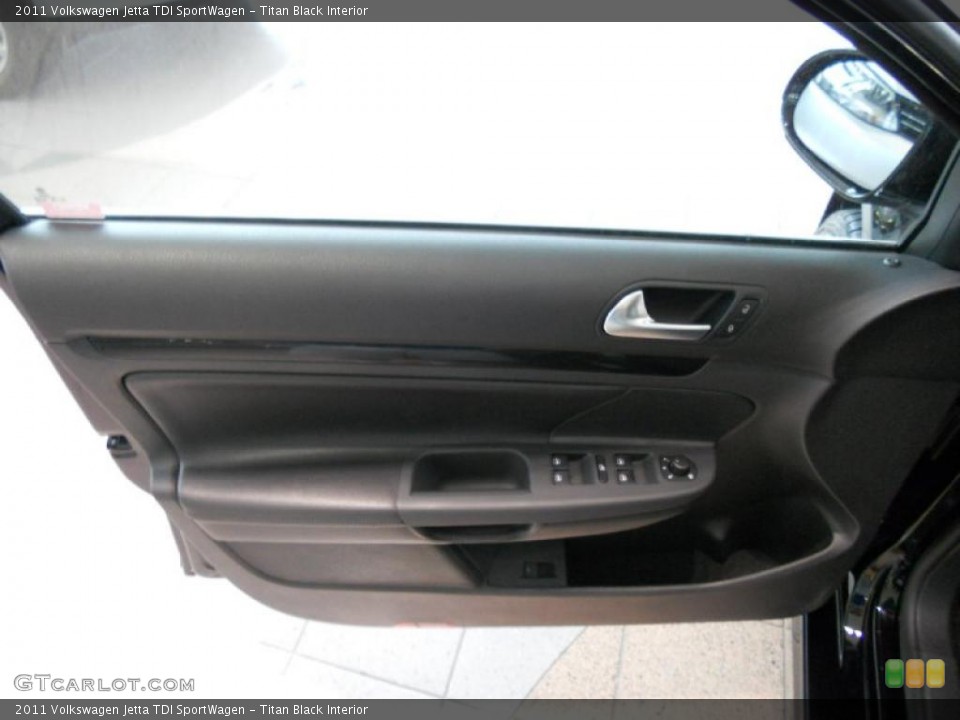 Titan Black Interior Door Panel for the 2011 Volkswagen Jetta TDI SportWagen #48661114