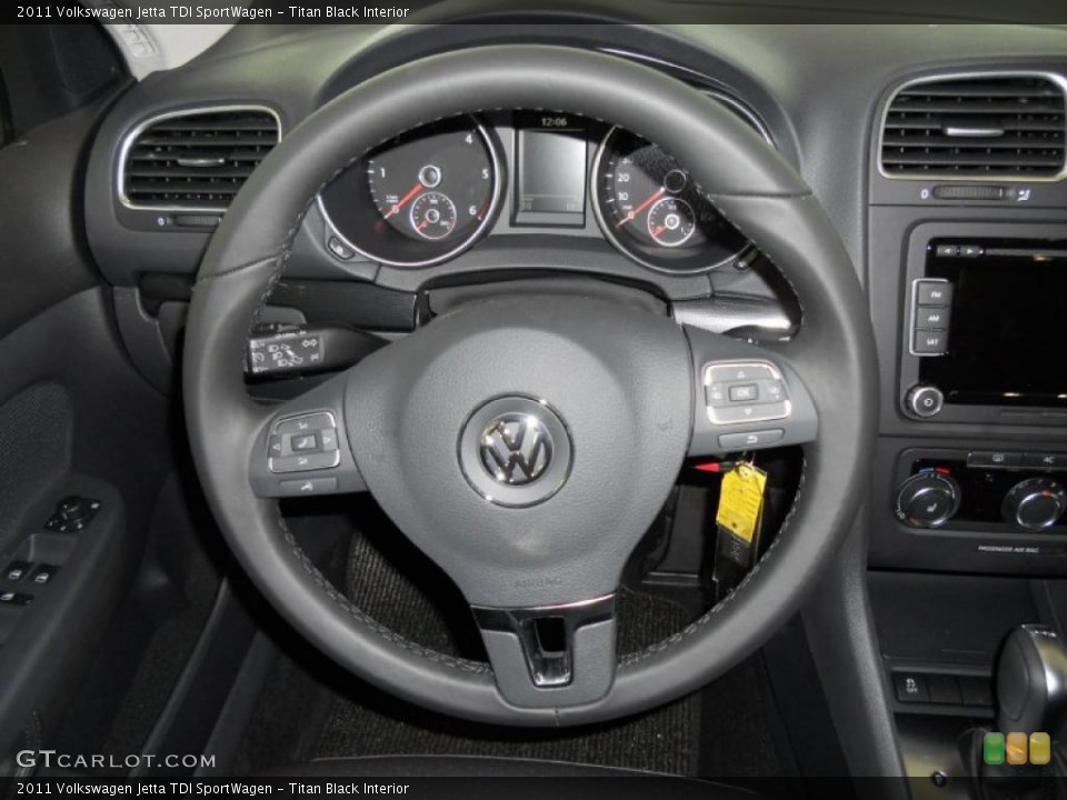 Titan Black Interior Steering Wheel for the 2011 Volkswagen Jetta TDI SportWagen #48661174