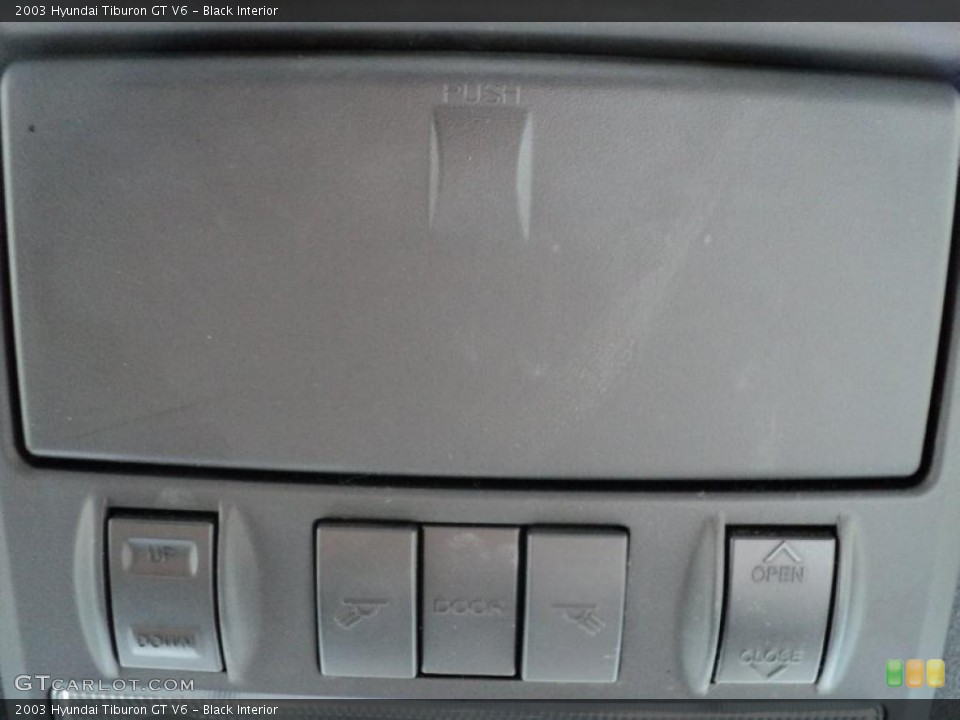 Black Interior Controls for the 2003 Hyundai Tiburon GT V6 #48685376
