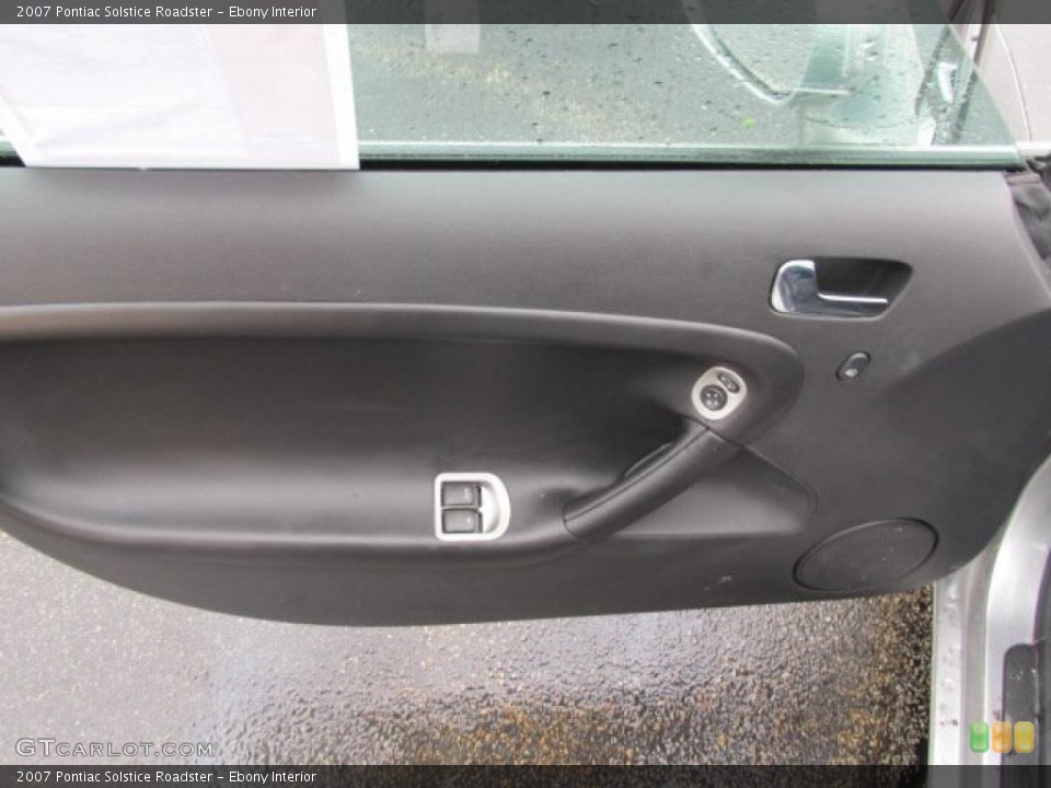 Ebony Interior Door Panel for the 2007 Pontiac Solstice Roadster #48708172