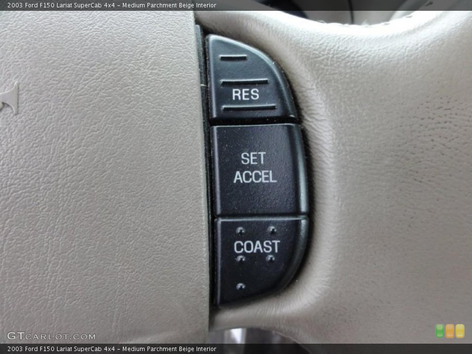 Medium Parchment Beige Interior Controls for the 2003 Ford F150 Lariat SuperCab 4x4 #48711594