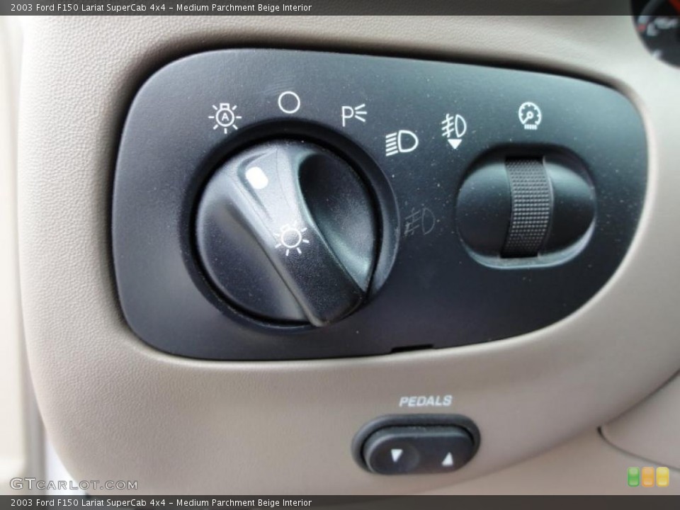 Medium Parchment Beige Interior Controls for the 2003 Ford F150 Lariat SuperCab 4x4 #48711622