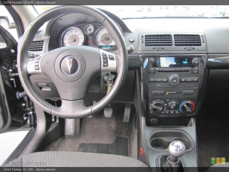 Ebony Interior Dashboard for the 2009 Pontiac G5 XFE #48723944