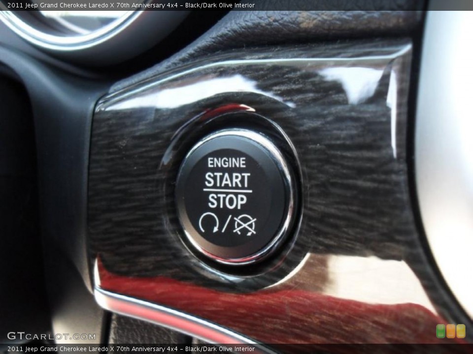 Black/Dark Olive Interior Controls for the 2011 Jeep Grand Cherokee Laredo X 70th Anniversary 4x4 #48739470