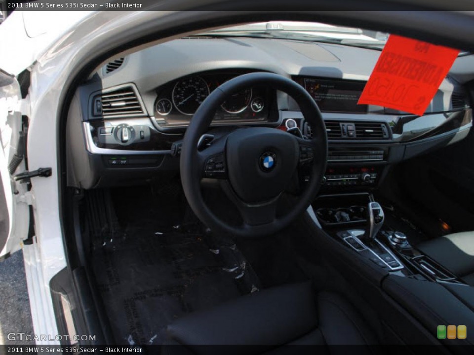 Black Interior Steering Wheel for the 2011 BMW 5 Series 535i Sedan #48747738