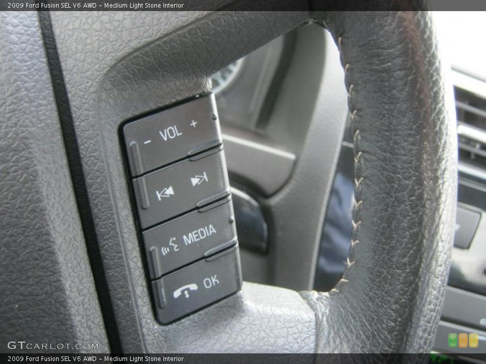 Medium Light Stone Interior Controls for the 2009 Ford Fusion SEL V6 AWD #48765991