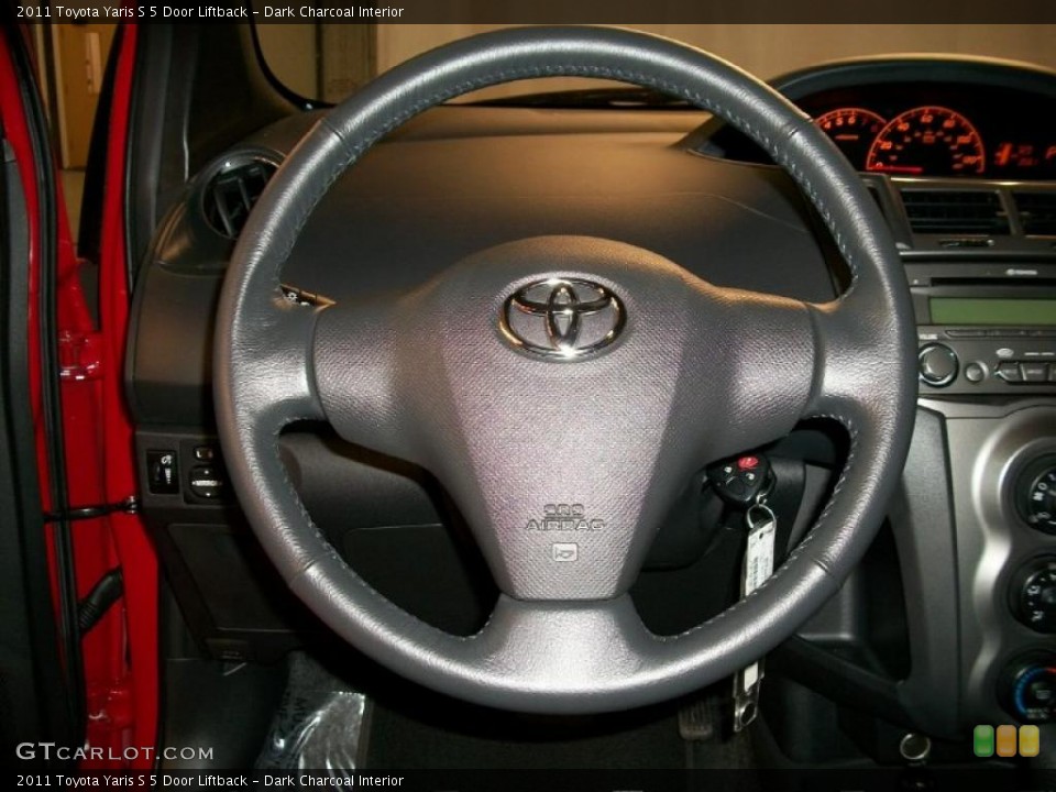 Dark Charcoal Interior Steering Wheel for the 2011 Toyota Yaris S 5 Door Liftback #48767581
